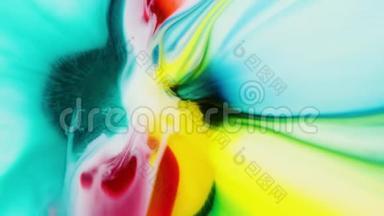 彩虹涂料在水中反应，创造奇妙的背景。 流体艺术。